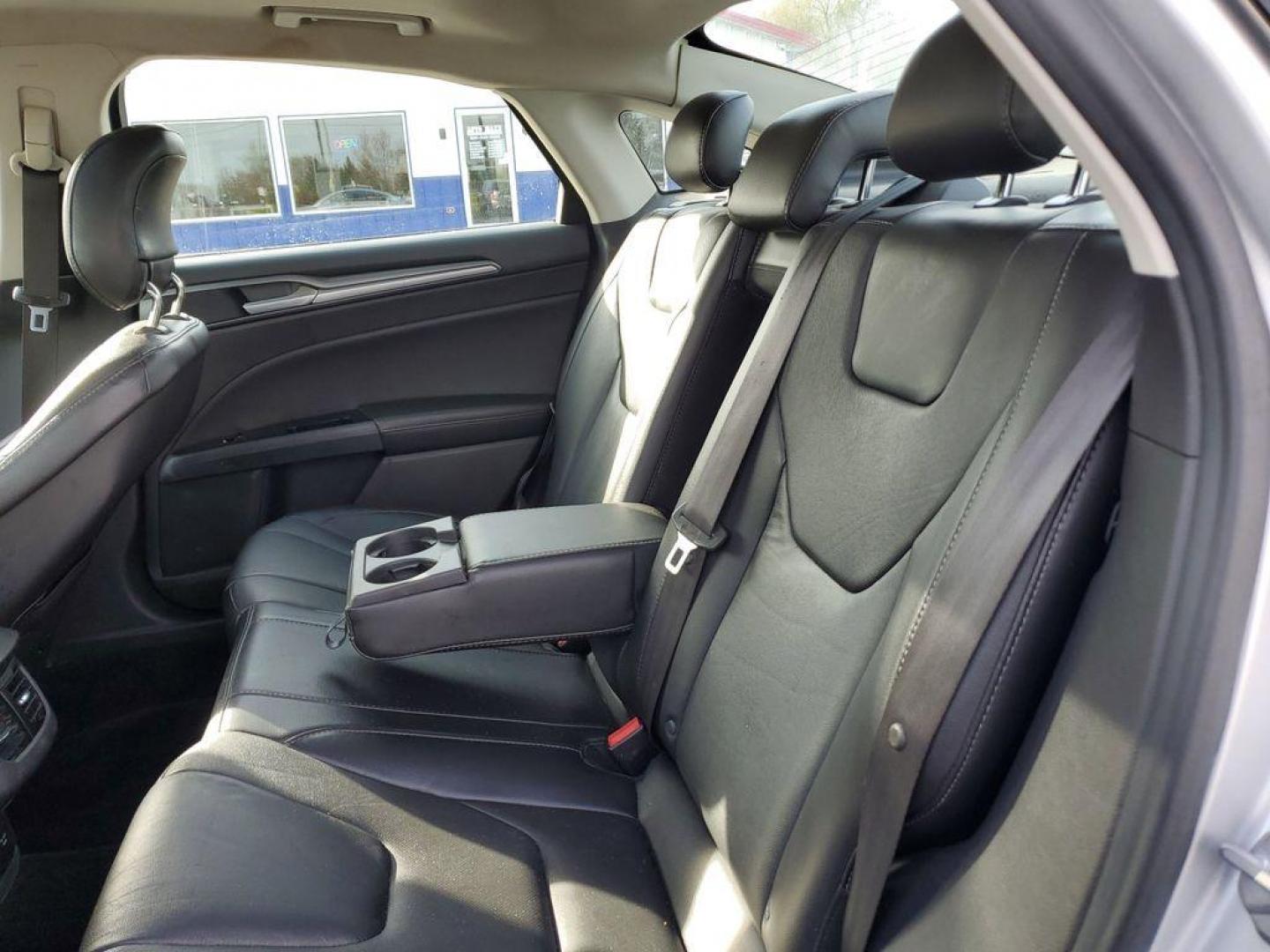 2014 Ingot Silver Metallic /Charcoal Black Ford Fusion Titanium AWD (3FA6P0D93ER) with an 2.0L L4 DOHC 16V engine, 6-speed automatic transmission, located at 6064 Gull Rd, Kalamazoo, MI, 49048, (269) 222-0088, 42.328388, -85.512924 - Discover the perfect blend of style, performance, and comfort with our 2014 Ford Fusion Titanium. This exceptional vehicle is equipped with all-wheel drive, ensuring confident handling and superior traction in all weather conditions. Under the hood, you'll find a robust 4-cylinder, 2.0L engine that - Photo#8