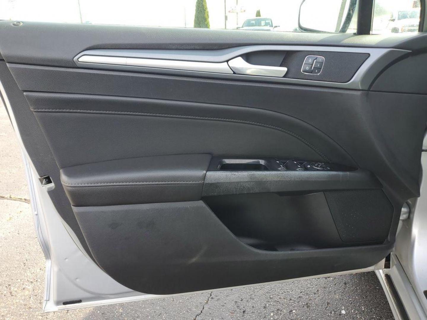 2014 Ingot Silver Metallic /Charcoal Black Ford Fusion Titanium AWD (3FA6P0D93ER) with an 2.0L L4 DOHC 16V engine, 6-speed automatic transmission, located at 6064 Gull Rd, Kalamazoo, MI, 49048, (269) 222-0088, 42.328388, -85.512924 - Discover the perfect blend of style, performance, and comfort with our 2014 Ford Fusion Titanium. This exceptional vehicle is equipped with all-wheel drive, ensuring confident handling and superior traction in all weather conditions. Under the hood, you'll find a robust 4-cylinder, 2.0L engine that - Photo#11
