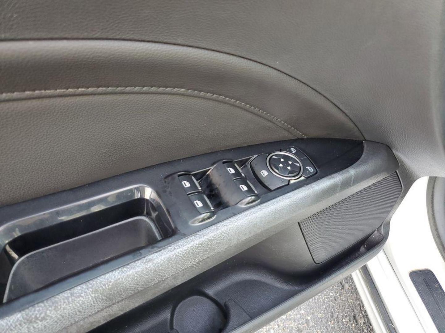 2014 Ingot Silver Metallic /Charcoal Black Ford Fusion Titanium AWD (3FA6P0D93ER) with an 2.0L L4 DOHC 16V engine, 6-speed automatic transmission, located at 6064 Gull Rd, Kalamazoo, MI, 49048, (269) 222-0088, 42.328388, -85.512924 - Discover the perfect blend of style, performance, and comfort with our 2014 Ford Fusion Titanium. This exceptional vehicle is equipped with all-wheel drive, ensuring confident handling and superior traction in all weather conditions. Under the hood, you'll find a robust 4-cylinder, 2.0L engine that - Photo#12