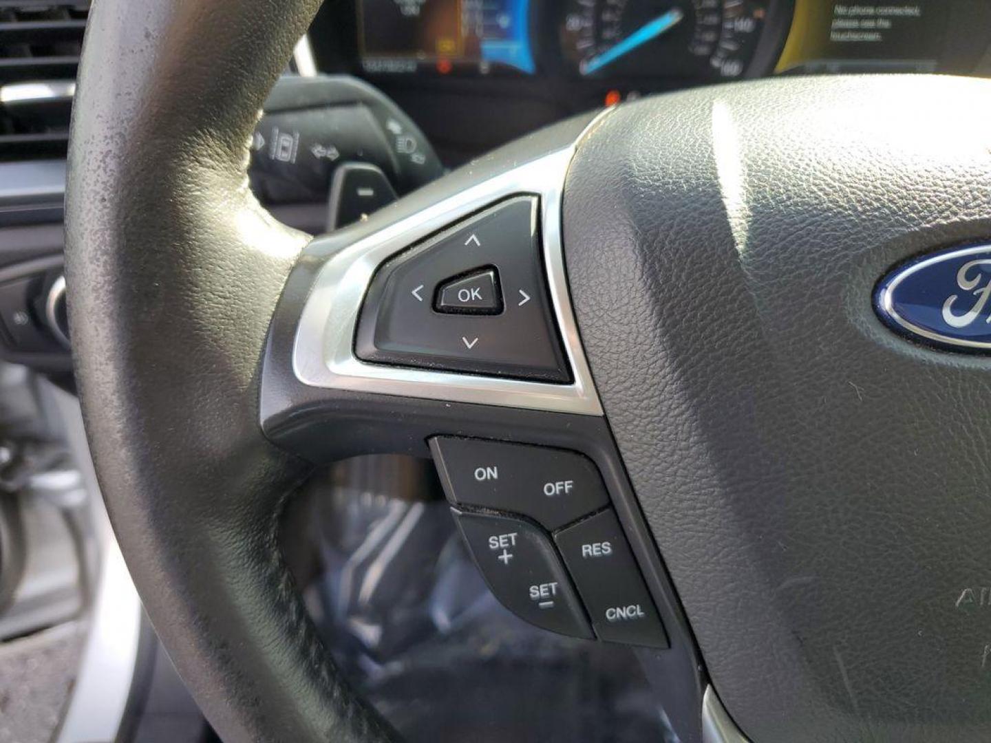 2014 Ingot Silver Metallic /Charcoal Black Ford Fusion Titanium AWD (3FA6P0D93ER) with an 2.0L L4 DOHC 16V engine, 6-speed automatic transmission, located at 6064 Gull Rd, Kalamazoo, MI, 49048, (269) 222-0088, 42.328388, -85.512924 - Discover the perfect blend of style, performance, and comfort with our 2014 Ford Fusion Titanium. This exceptional vehicle is equipped with all-wheel drive, ensuring confident handling and superior traction in all weather conditions. Under the hood, you'll find a robust 4-cylinder, 2.0L engine that - Photo#19
