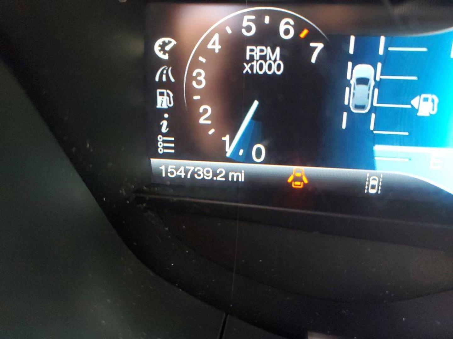 2014 Ingot Silver Metallic /Charcoal Black Ford Fusion Titanium AWD (3FA6P0D93ER) with an 2.0L L4 DOHC 16V engine, 6-speed automatic transmission, located at 6064 Gull Rd, Kalamazoo, MI, 49048, (269) 222-0088, 42.328388, -85.512924 - Discover the perfect blend of style, performance, and comfort with our 2014 Ford Fusion Titanium. This exceptional vehicle is equipped with all-wheel drive, ensuring confident handling and superior traction in all weather conditions. Under the hood, you'll find a robust 4-cylinder, 2.0L engine that - Photo#21