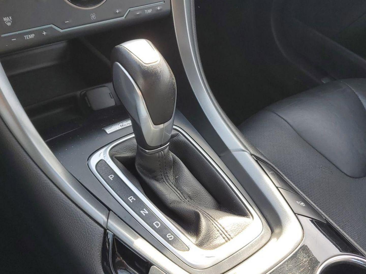 2014 Ingot Silver Metallic /Charcoal Black Ford Fusion Titanium AWD (3FA6P0D93ER) with an 2.0L L4 DOHC 16V engine, 6-speed automatic transmission, located at 6064 Gull Rd, Kalamazoo, MI, 49048, (269) 222-0088, 42.328388, -85.512924 - Discover the perfect blend of style, performance, and comfort with our 2014 Ford Fusion Titanium. This exceptional vehicle is equipped with all-wheel drive, ensuring confident handling and superior traction in all weather conditions. Under the hood, you'll find a robust 4-cylinder, 2.0L engine that - Photo#25