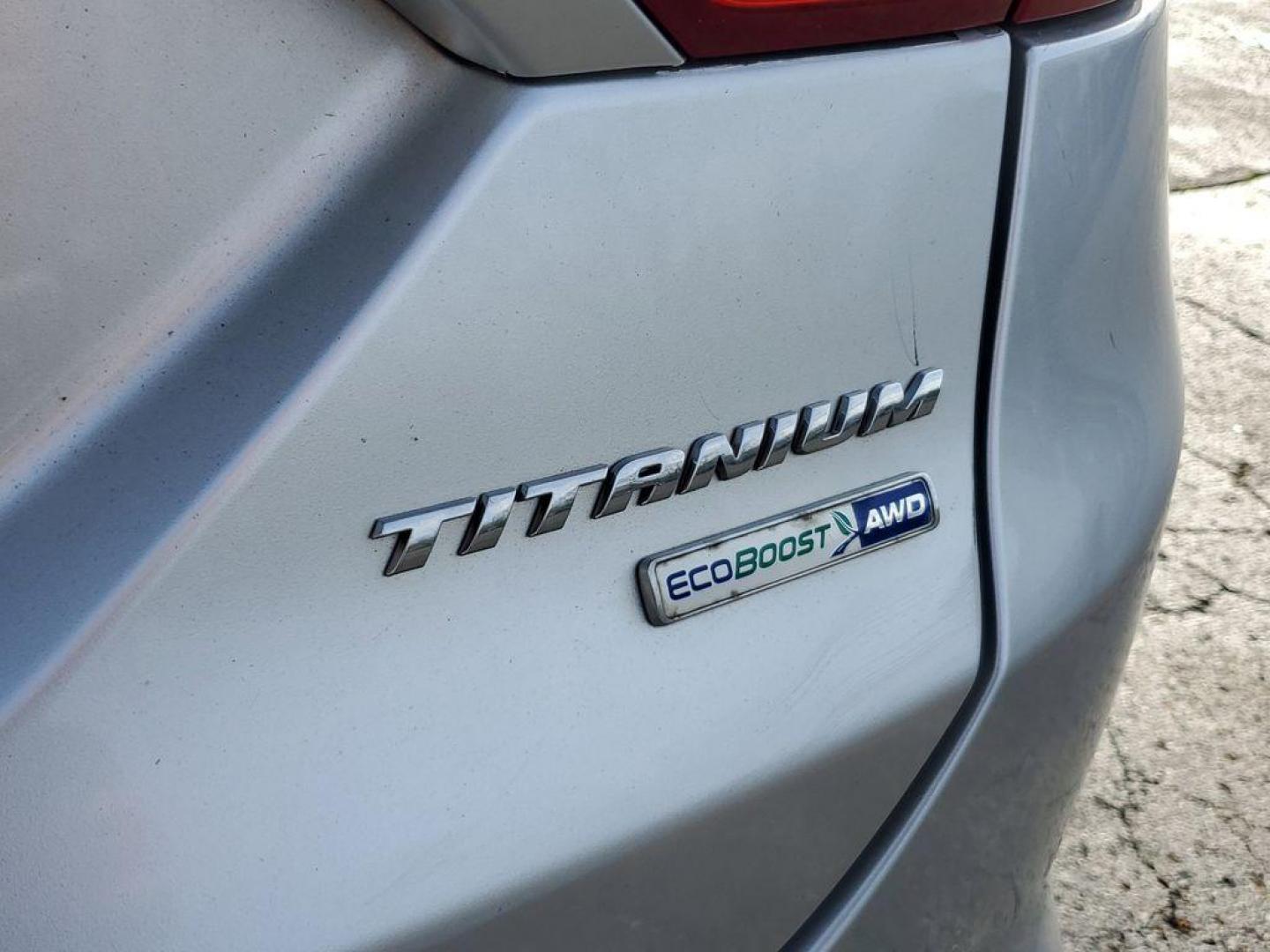 2014 Ingot Silver Metallic /Charcoal Black Ford Fusion Titanium AWD (3FA6P0D93ER) with an 2.0L L4 DOHC 16V engine, 6-speed automatic transmission, located at 6064 Gull Rd, Kalamazoo, MI, 49048, (269) 222-0088, 42.328388, -85.512924 - Discover the perfect blend of style, performance, and comfort with our 2014 Ford Fusion Titanium. This exceptional vehicle is equipped with all-wheel drive, ensuring confident handling and superior traction in all weather conditions. Under the hood, you'll find a robust 4-cylinder, 2.0L engine that - Photo#6