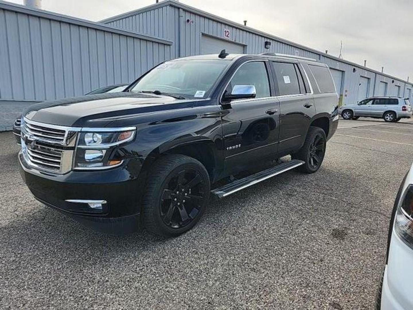 2017 Black Chevrolet Tahoe Premier 4WD (1GNSKCKC2HR) with an 5.3L V8 OHV 16V engine, 6A transmission, located at 6064 Gull Rd, Kalamazoo, MI, 49048, (269) 222-0088, 42.328388, -85.512924 - <b>Vehicle Details</b><br>Discover the remarkable 2017 Chevrolet Tahoe Premier, an extraordinary SUV that combines power, luxury, and reliability. With only 0 miles on the odometer, this pristine vehicle is ready to become your trusted companion on every adventure. Equipped with a formidable V8, 5.3 - Photo#0