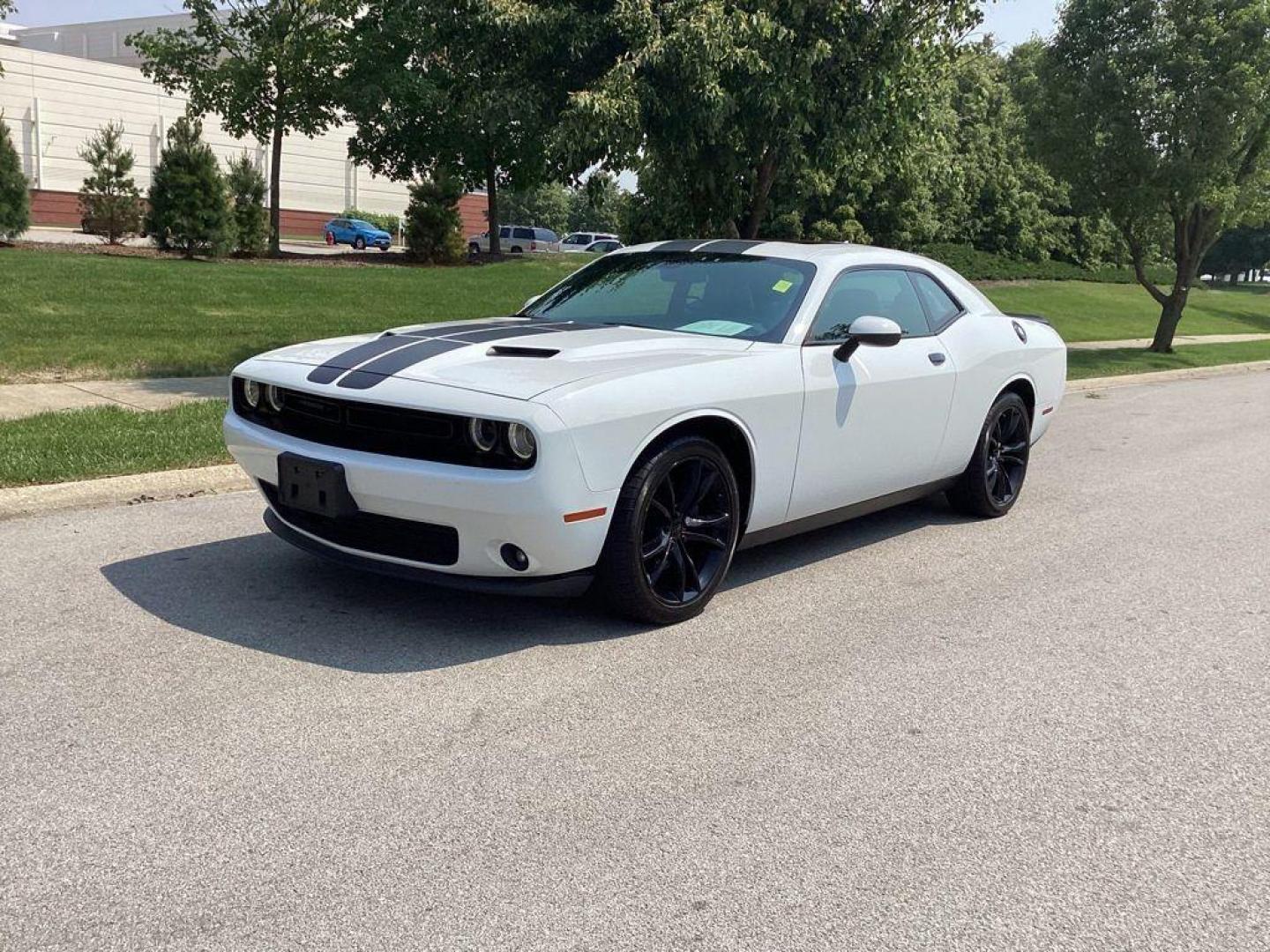 2017 /Black Dodge Challenger SXT (2C3CDZAG6HH) with an 3.6L V6 DOHC 24V engine, 8A transmission, located at 6064 Gull Rd, Kalamazoo, MI, 49048, (269) 222-0088, 42.328388, -85.512924 - <b>Summary</b><br>Power Moonroof<br><br><b>Vehicle Details</b><br>Experience the thrill of driving with this stunning 2017 Dodge Challenger SXT, a true embodiment of power and style. This remarkable vehicle features a robust V6, 3.6L engine paired with rear-wheel drive, offering an exhilarating yet - Photo#0