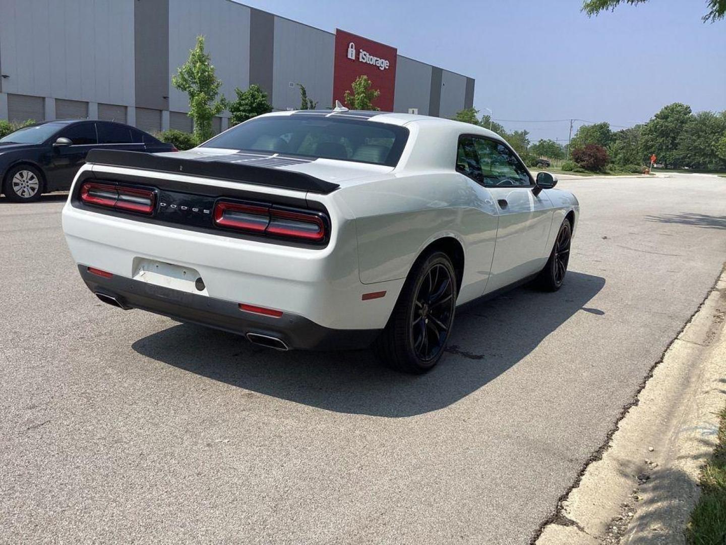2017 /Black Dodge Challenger SXT (2C3CDZAG6HH) with an 3.6L V6 DOHC 24V engine, 8A transmission, located at 6064 Gull Rd, Kalamazoo, MI, 49048, (269) 222-0088, 42.328388, -85.512924 - <b>Summary</b><br>Power Moonroof<br><br><b>Vehicle Details</b><br>Experience the thrill of driving with this stunning 2017 Dodge Challenger SXT, a true embodiment of power and style. This remarkable vehicle features a robust V6, 3.6L engine paired with rear-wheel drive, offering an exhilarating yet - Photo#11