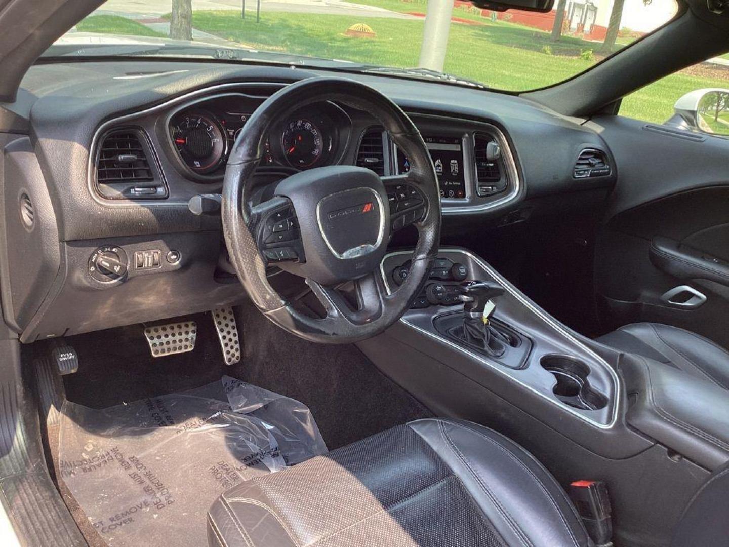 2017 /Black Dodge Challenger SXT (2C3CDZAG6HH) with an 3.6L V6 DOHC 24V engine, 8A transmission, located at 6064 Gull Rd, Kalamazoo, MI, 49048, (269) 222-0088, 42.328388, -85.512924 - <b>Summary</b><br>Power Moonroof<br><br><b>Vehicle Details</b><br>Experience the thrill of driving with this stunning 2017 Dodge Challenger SXT, a true embodiment of power and style. This remarkable vehicle features a robust V6, 3.6L engine paired with rear-wheel drive, offering an exhilarating yet - Photo#13