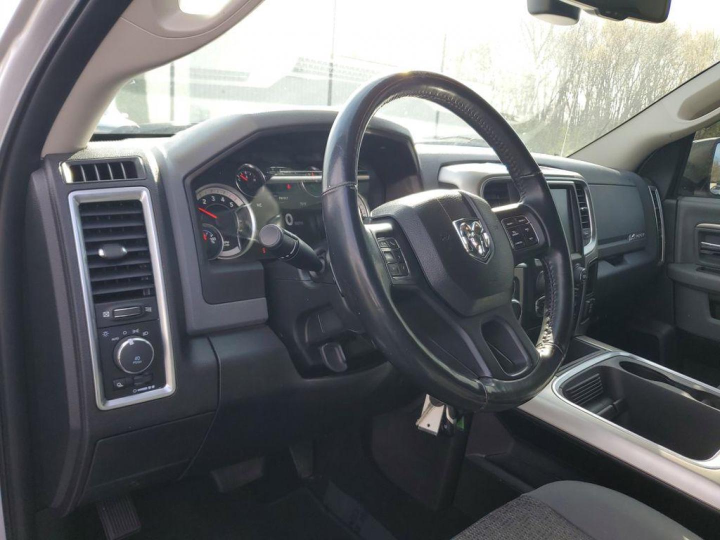 2017 Bright Silver Metallic Clearcoat /Diesel Gray/Black RAM 1500 SLT Crew Cab SWB 4WD (1C6RR7LM7HS) with an 3.0L V6 DIESEL engine, 8A transmission, located at 6064 Gull Rd, Kalamazoo, MI, 49048, (269) 222-0088, 42.328388, -85.512924 - Unleash the power and versatility of the 2017 Ram 1500 Big Horn, a truck that perfectly marries rugged capability with modern luxury. Equipped with a robust V6, 3.0L engine and dependable 4WD, this powerhouse is ready to tackle any terrain or weather condition with ease, making it your ideal partner - Photo#14