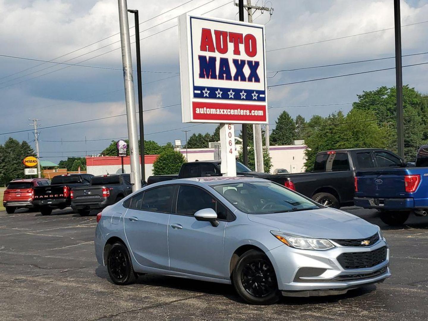2018 Arctic Blue Metallic /Jet Black Chevrolet Cruze LS Auto (1G1BC5SM1J7) with an 1.4L L4 DOHC 16V TURBO engine, 6A transmission, located at 6064 Gull Rd, Kalamazoo, MI, 49048, (269) 222-0088, 42.328388, -85.512924 - Discover the perfect blend of efficiency, technology, and style with this 2018 Chevrolet Cruze LS. This meticulously maintained vehicle offers front-wheel drive and is powered by a fuel-efficient 1.4L, 4-cylinder engine, making it an ideal choice for both city driving and weekend getaways. <br><br>S - Photo#0