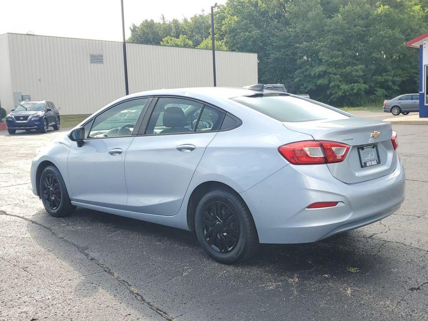 2018 Arctic Blue Metallic /Jet Black Chevrolet Cruze LS Auto (1G1BC5SM1J7) with an 1.4L L4 DOHC 16V TURBO engine, 6A transmission, located at 6064 Gull Rd, Kalamazoo, MI, 49048, (269) 222-0088, 42.328388, -85.512924 - Discover the perfect blend of efficiency, technology, and style with this 2018 Chevrolet Cruze LS. This meticulously maintained vehicle offers front-wheel drive and is powered by a fuel-efficient 1.4L, 4-cylinder engine, making it an ideal choice for both city driving and weekend getaways. <br><br>S - Photo#2