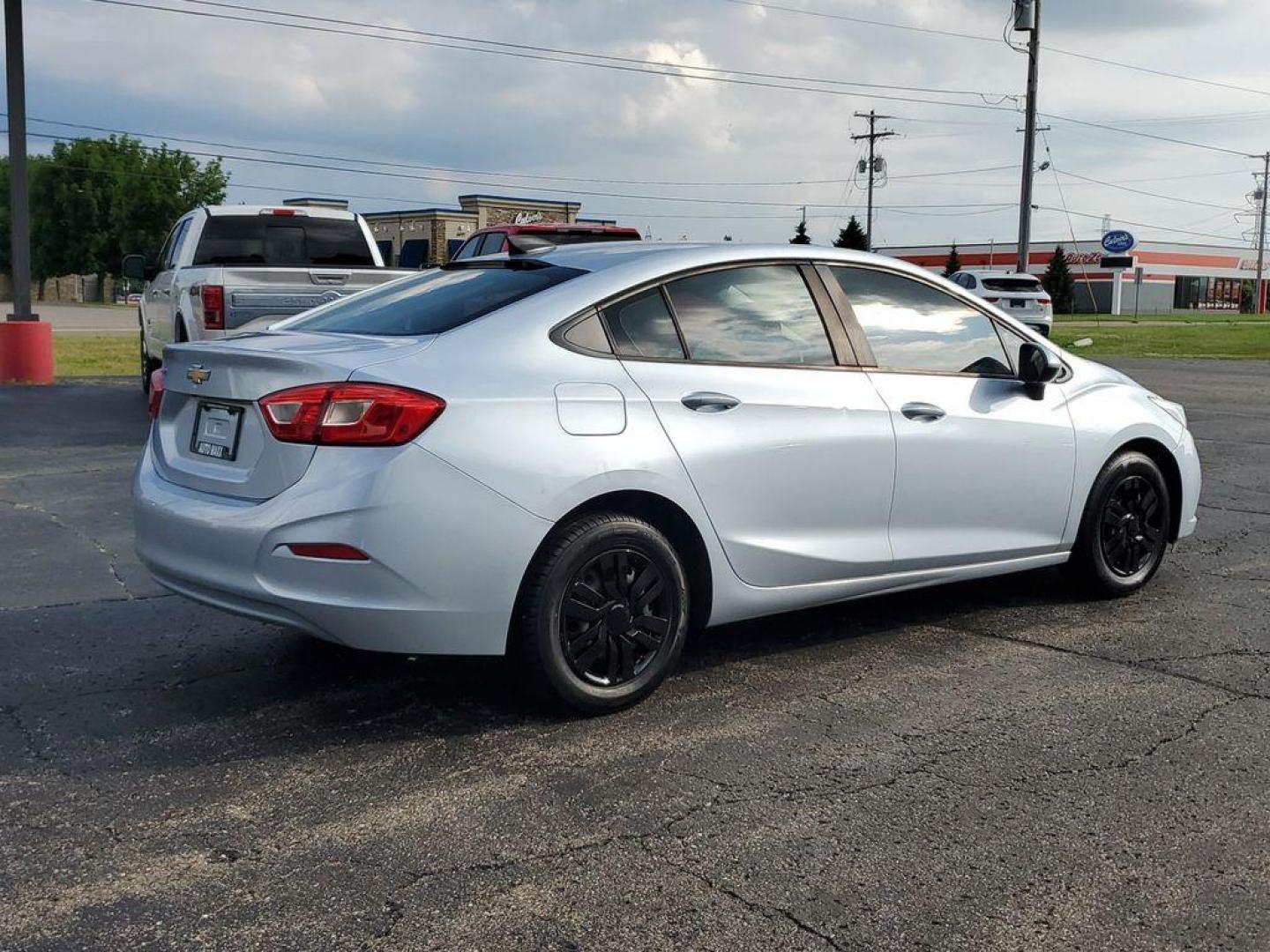 2018 Arctic Blue Metallic /Jet Black Chevrolet Cruze LS Auto (1G1BC5SM1J7) with an 1.4L L4 DOHC 16V TURBO engine, 6A transmission, located at 6064 Gull Rd, Kalamazoo, MI, 49048, (269) 222-0088, 42.328388, -85.512924 - Discover the perfect blend of efficiency, technology, and style with this 2018 Chevrolet Cruze LS. This meticulously maintained vehicle offers front-wheel drive and is powered by a fuel-efficient 1.4L, 4-cylinder engine, making it an ideal choice for both city driving and weekend getaways. <br><br>S - Photo#3