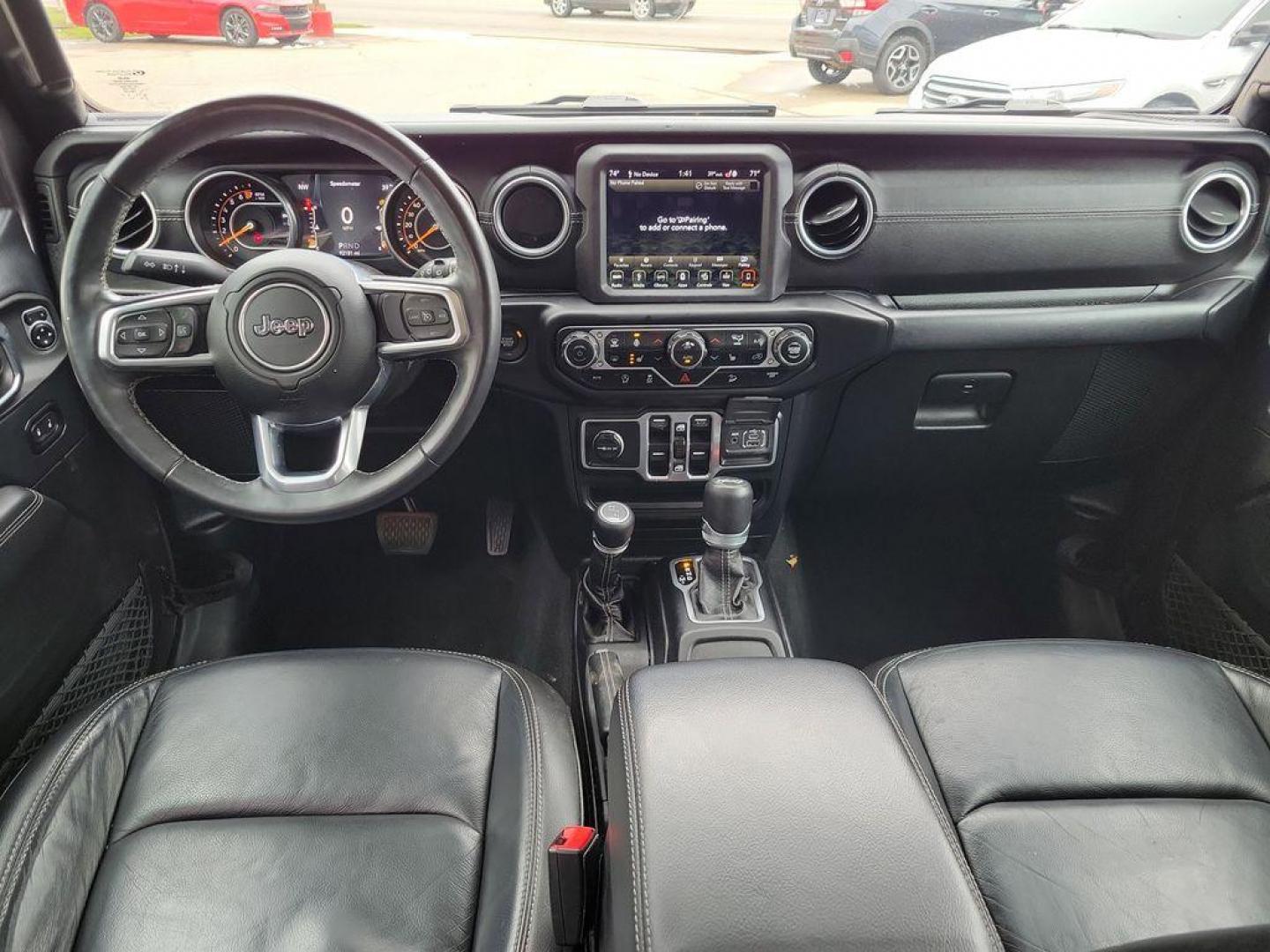 2018 Granite Crystal Metallic Clearcoat /Black Jeep Wrangler JK Unlimited Sahara (1C4HJXEG7JW) with an 3.6L V6 DOHC 24V FFV engine, 6A transmission, located at 234 Columbia Ave, Battle Creek, MI, 49015, (269) 222-0088, 42.298264, -85.192543 - <b>Vehicle Details</b><br>Discover adventure in this 2018 Jeep Wrangler Sahara, a perfect blend of ruggedness and comfort. Equipped with a powerful V6, 3.6L engine and 4WD, this versatile SUV is ready to conquer both city streets and off-road trails. Its classic design is complemented by modern feat - Photo#8