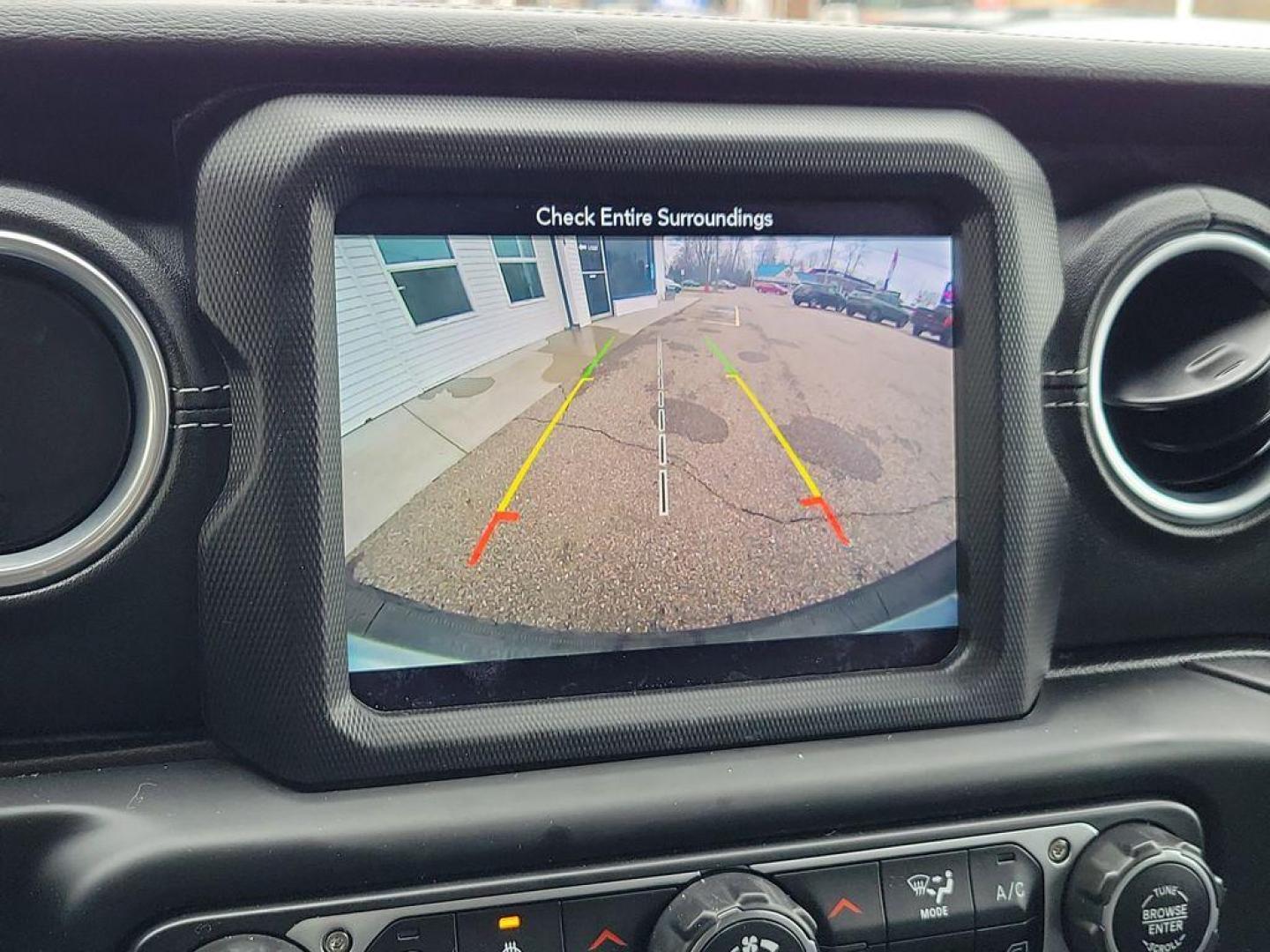 2018 Granite Crystal Metallic Clearcoat /Black Jeep Wrangler JK Unlimited Sahara (1C4HJXEG7JW) with an 3.6L V6 DOHC 24V FFV engine, 6A transmission, located at 234 Columbia Ave, Battle Creek, MI, 49015, (269) 222-0088, 42.298264, -85.192543 - <b>Vehicle Details</b><br>Discover adventure in this 2018 Jeep Wrangler Sahara, a perfect blend of ruggedness and comfort. Equipped with a powerful V6, 3.6L engine and 4WD, this versatile SUV is ready to conquer both city streets and off-road trails. Its classic design is complemented by modern feat - Photo#24