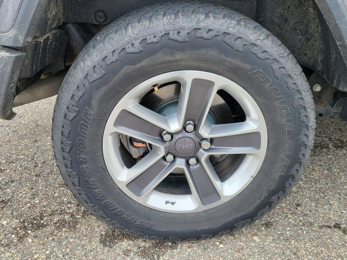 2018 Granite Crystal Metallic Clearcoat /Black Jeep Wrangler JK Unlimited Sahara (1C4HJXEG7JW) with an 3.6L V6 DOHC 24V FFV engine, 6A transmission, located at 234 Columbia Ave, Battle Creek, MI, 49015, (269) 222-0088, 42.298264, -85.192543 - <b>Vehicle Details</b><br>Discover adventure in this 2018 Jeep Wrangler Sahara, a perfect blend of ruggedness and comfort. Equipped with a powerful V6, 3.6L engine and 4WD, this versatile SUV is ready to conquer both city streets and off-road trails. Its classic design is complemented by modern feat - Photo#4
