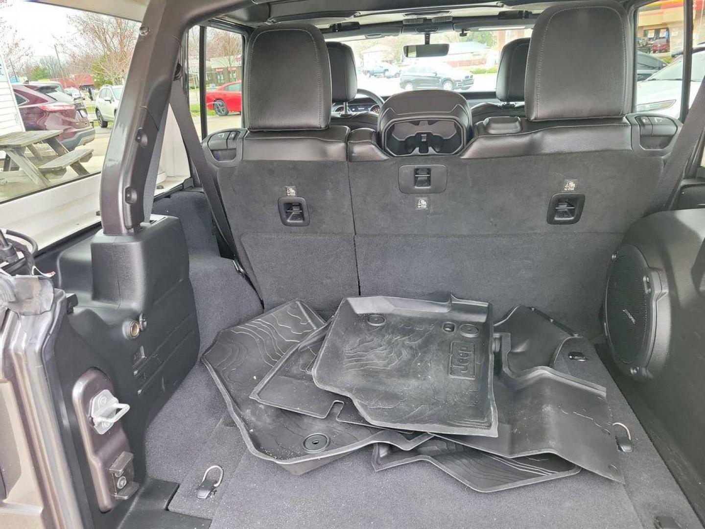 2018 Granite Crystal Metallic Clearcoat /Black Jeep Wrangler JK Unlimited Sahara (1C4HJXEG7JW) with an 3.6L V6 DOHC 24V FFV engine, 6A transmission, located at 234 Columbia Ave, Battle Creek, MI, 49015, (269) 222-0088, 42.298264, -85.192543 - <b>Vehicle Details</b><br>Discover adventure in this 2018 Jeep Wrangler Sahara, a perfect blend of ruggedness and comfort. Equipped with a powerful V6, 3.6L engine and 4WD, this versatile SUV is ready to conquer both city streets and off-road trails. Its classic design is complemented by modern feat - Photo#5