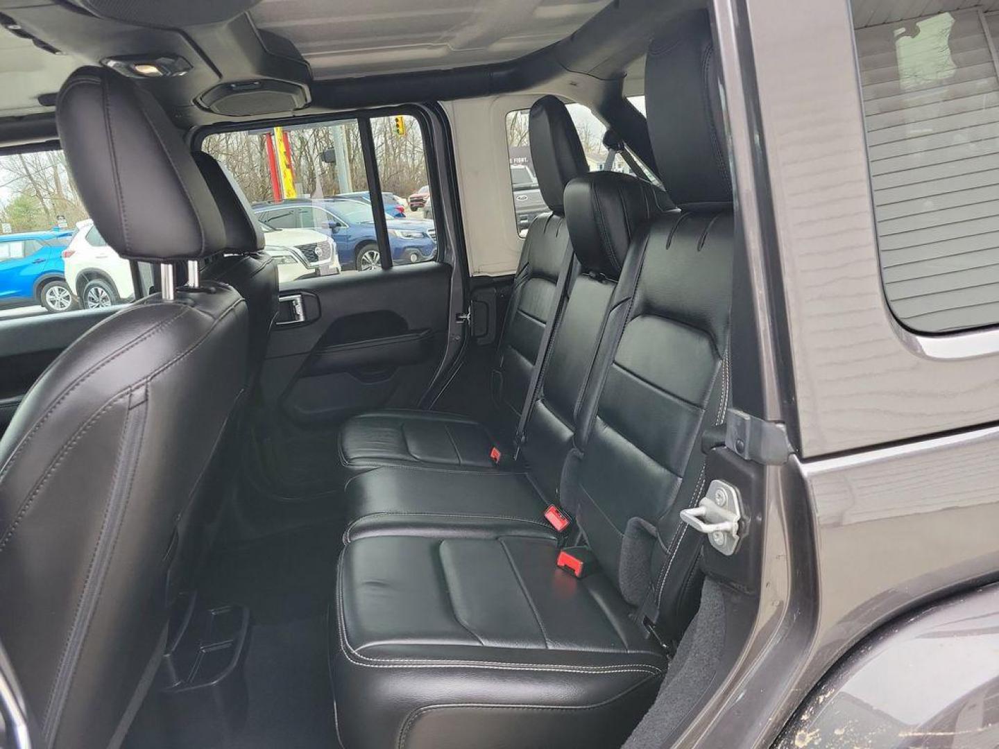 2018 Granite Crystal Metallic Clearcoat /Black Jeep Wrangler JK Unlimited Sahara (1C4HJXEG7JW) with an 3.6L V6 DOHC 24V FFV engine, 6A transmission, located at 234 Columbia Ave, Battle Creek, MI, 49015, (269) 222-0088, 42.298264, -85.192543 - <b>Vehicle Details</b><br>Discover adventure in this 2018 Jeep Wrangler Sahara, a perfect blend of ruggedness and comfort. Equipped with a powerful V6, 3.6L engine and 4WD, this versatile SUV is ready to conquer both city streets and off-road trails. Its classic design is complemented by modern feat - Photo#6