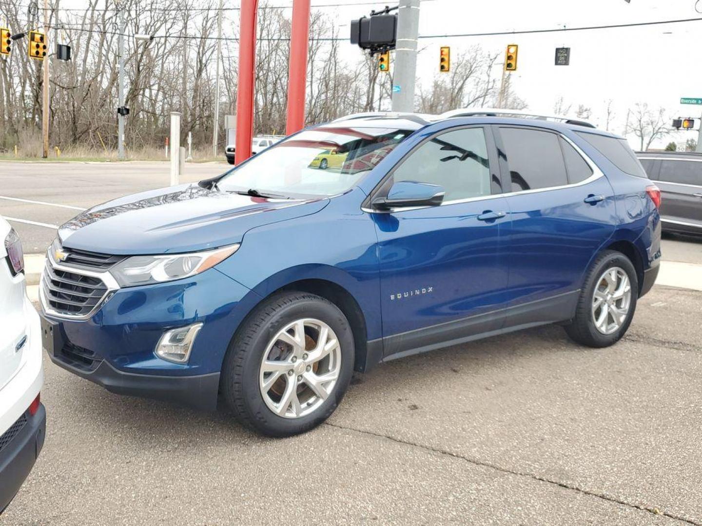 2019 Pacific Blue Metallic /Medium Ash Gray Chevrolet Equinox LT 2.0 AWD (3GNAXVEX9KL) with an 2.0L L4 DOHC 16V engine, 9A transmission, located at 234 Columbia Ave, Battle Creek, MI, 49015, (269) 222-0088, 42.298264, -85.192543 - <b>Vehicle Details</b><br>Discover the versatility and reliability of the 2019 Chevrolet Equinox LT with AWDa perfect blend of performance and technology. This exceptional SUV is powered by a robust 4-cylinder, 2.0L engine that delivers a balanced mix of power and efficiency, making it ideal for bot - Photo#3