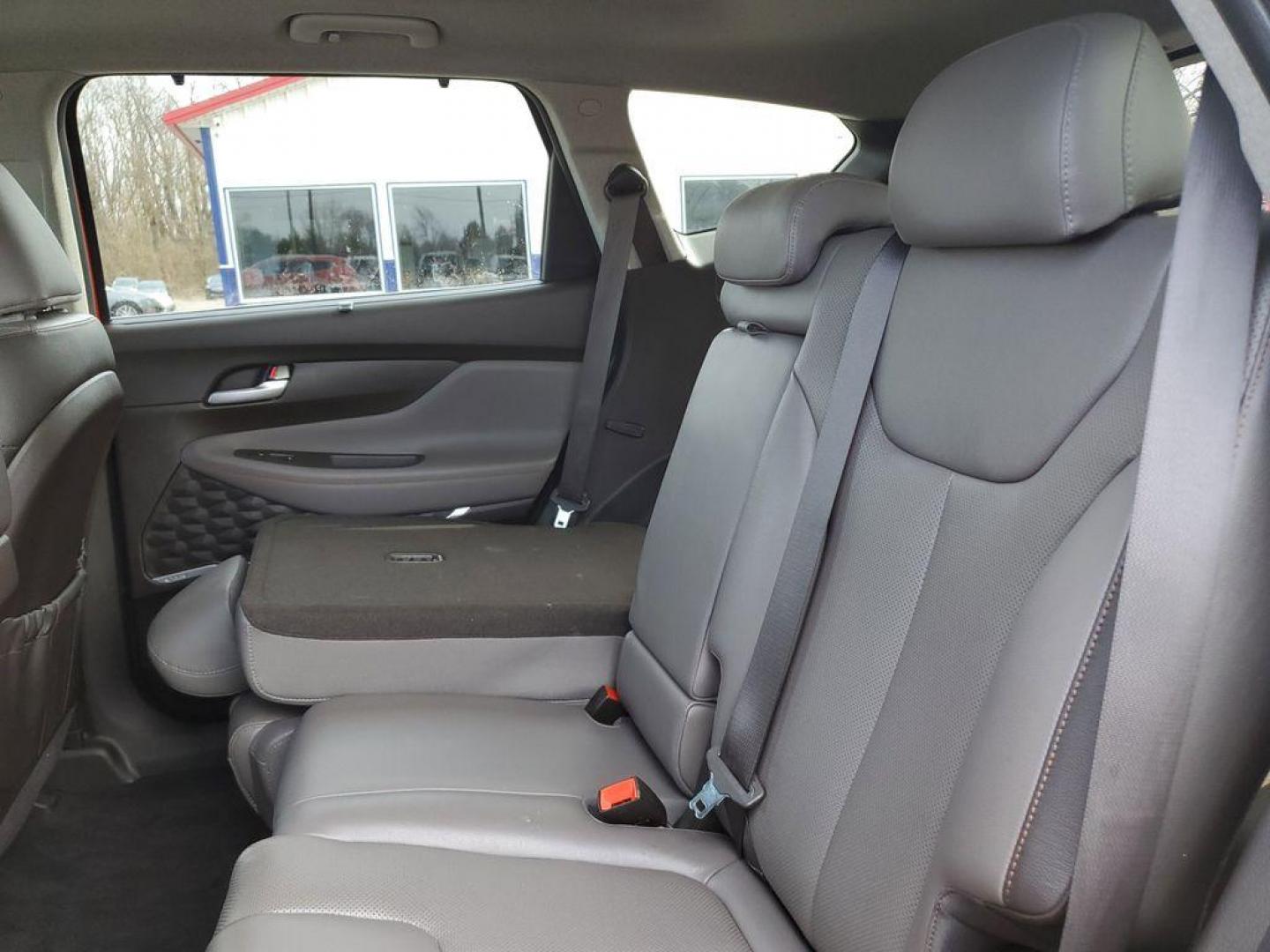 2020 Lava Orange /Espresso/Gray Hyundai Santa Fe Ultimate 2.0T AWD (5NMS5CAA7LH) with an 2.0L L4 DOHC 16V TURBO engine, 6A transmission, located at 6064 Gull Rd, Kalamazoo, MI, 49048, (269) 222-0088, 42.328388, -85.512924 - <b>Summary</b><br>NAVIGATION PACKAGE Power Moonroof<br><br><b>Vehicle Details</b><br>Discover the pristine elegance and unbeatable performance of the 2020 Hyundai Santa Fe Limited, the ultimate vehicle for those who crave adventure without compromising on luxury. With only 0 miles on the odometer, t - Photo#9