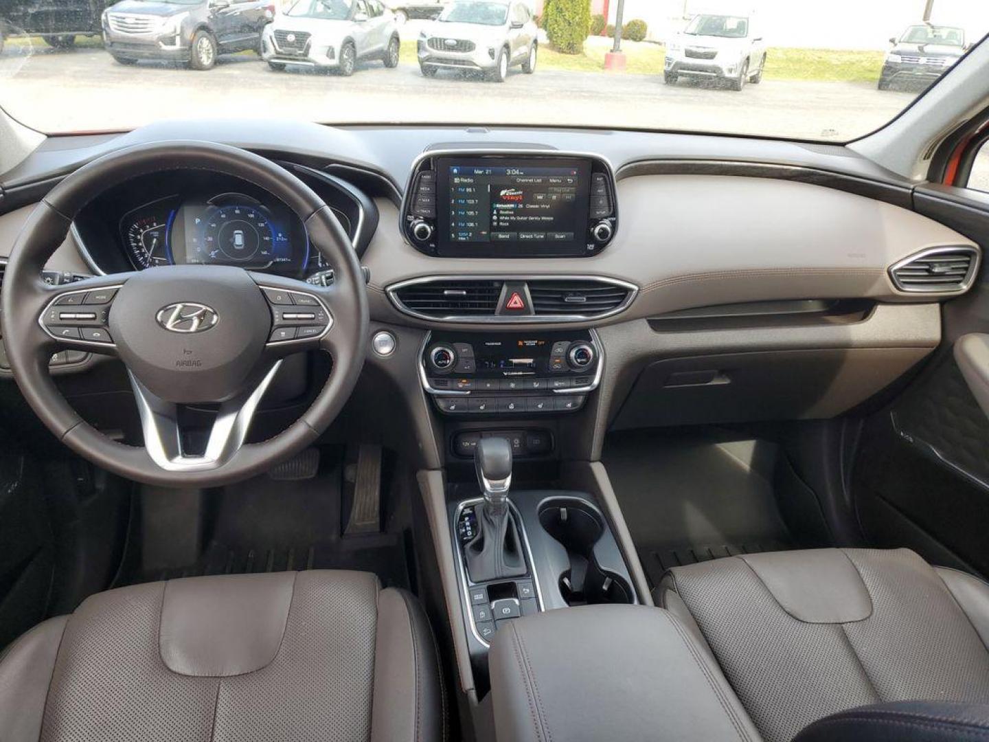 2020 Lava Orange /Espresso/Gray Hyundai Santa Fe Ultimate 2.0T AWD (5NMS5CAA7LH) with an 2.0L L4 DOHC 16V TURBO engine, 6A transmission, located at 6064 Gull Rd, Kalamazoo, MI, 49048, (269) 222-0088, 42.328388, -85.512924 - <b>Summary</b><br>NAVIGATION PACKAGE Power Moonroof<br><br><b>Vehicle Details</b><br>Discover the pristine elegance and unbeatable performance of the 2020 Hyundai Santa Fe Limited, the ultimate vehicle for those who crave adventure without compromising on luxury. With only 0 miles on the odometer, t - Photo#10