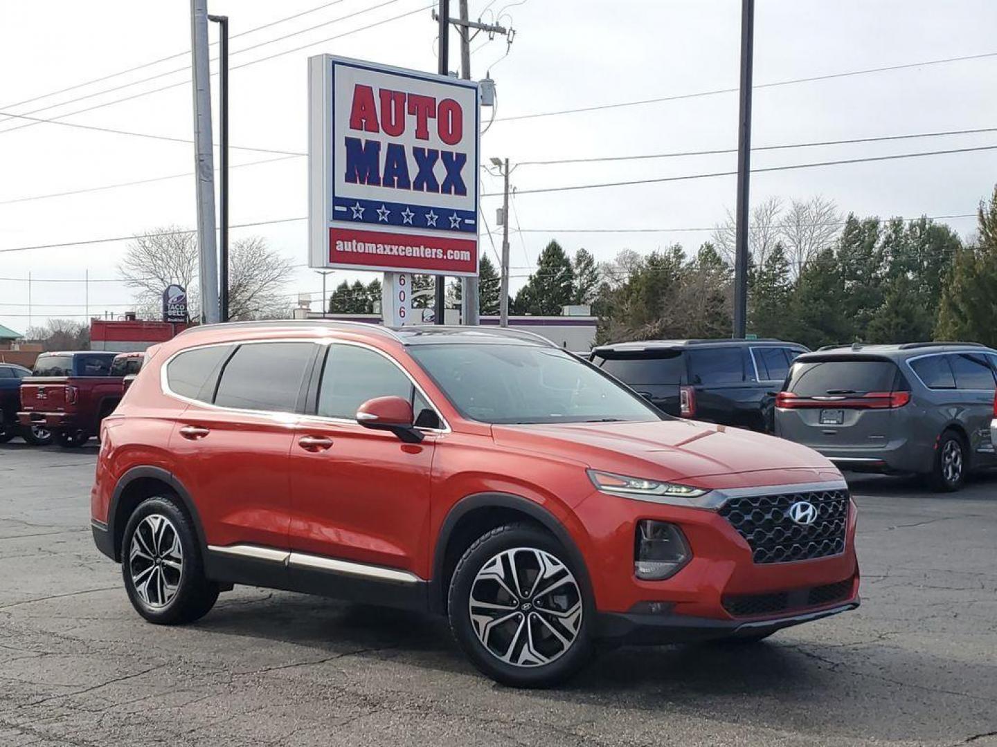 2020 Lava Orange /Espresso/Gray Hyundai Santa Fe Ultimate 2.0T AWD (5NMS5CAA7LH) with an 2.0L L4 DOHC 16V TURBO engine, 6A transmission, located at 6064 Gull Rd, Kalamazoo, MI, 49048, (269) 222-0088, 42.328388, -85.512924 - <b>Summary</b><br>NAVIGATION PACKAGE Power Moonroof<br><br><b>Vehicle Details</b><br>Discover the pristine elegance and unbeatable performance of the 2020 Hyundai Santa Fe Limited, the ultimate vehicle for those who crave adventure without compromising on luxury. With only 0 miles on the odometer, t - Photo#0