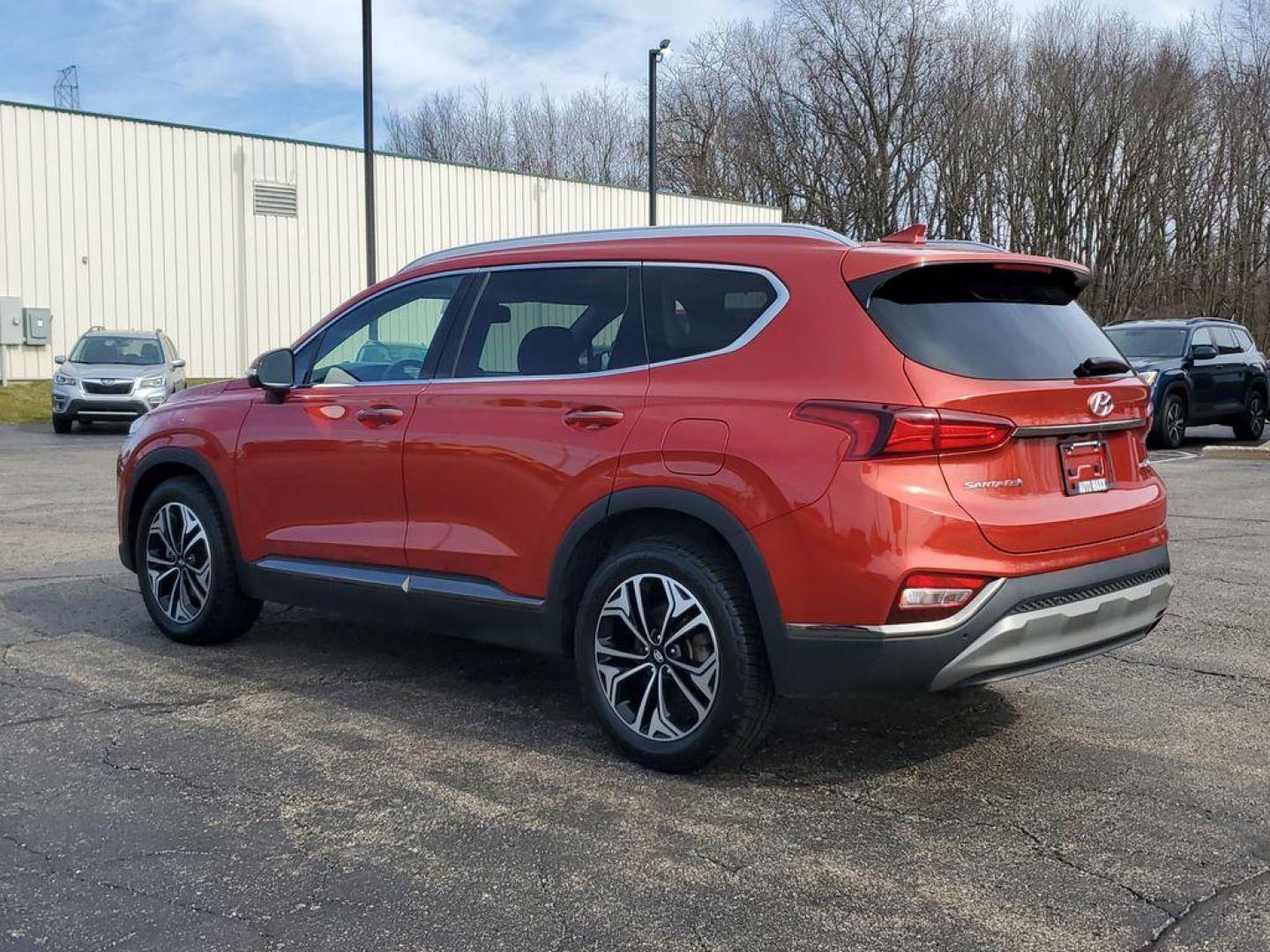 2020 Lava Orange /Espresso/Gray Hyundai Santa Fe Ultimate 2.0T AWD (5NMS5CAA7LH) with an 2.0L L4 DOHC 16V TURBO engine, 6A transmission, located at 6064 Gull Rd, Kalamazoo, MI, 49048, (269) 222-0088, 42.328388, -85.512924 - <b>Summary</b><br>NAVIGATION PACKAGE Power Moonroof<br><br><b>Vehicle Details</b><br>Discover the pristine elegance and unbeatable performance of the 2020 Hyundai Santa Fe Limited, the ultimate vehicle for those who crave adventure without compromising on luxury. With only 0 miles on the odometer, t - Photo#2