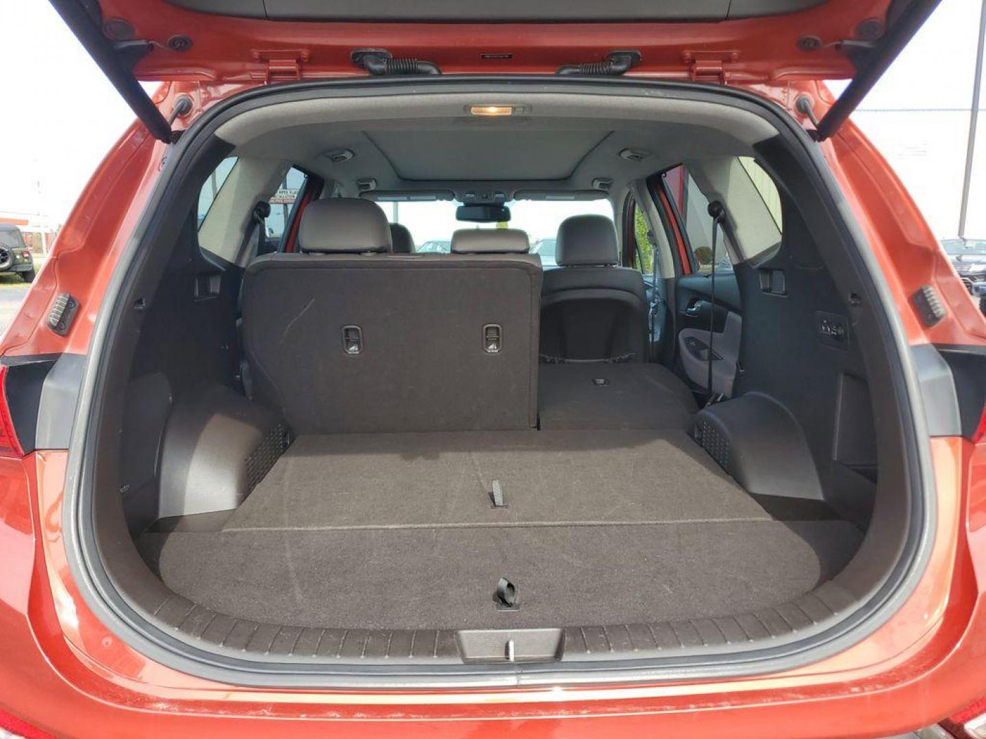 2020 Lava Orange /Espresso/Gray Hyundai Santa Fe Ultimate 2.0T AWD (5NMS5CAA7LH) with an 2.0L L4 DOHC 16V TURBO engine, 6A transmission, located at 6064 Gull Rd, Kalamazoo, MI, 49048, (269) 222-0088, 42.328388, -85.512924 - <b>Summary</b><br>NAVIGATION PACKAGE Power Moonroof<br><br><b>Vehicle Details</b><br>Discover the pristine elegance and unbeatable performance of the 2020 Hyundai Santa Fe Limited, the ultimate vehicle for those who crave adventure without compromising on luxury. With only 0 miles on the odometer, t - Photo#7