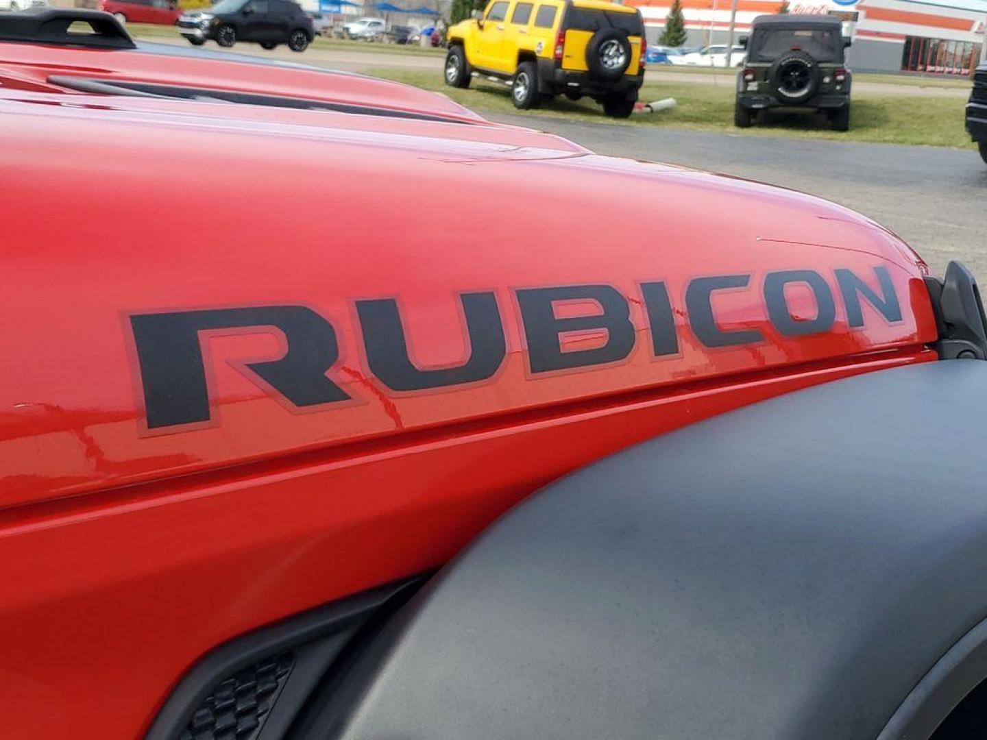 2020 Red /Black Jeep Gladiator Rubicon (1C6JJTBG9LL) with an 3.6L V6 DOHC 24V engine, 6M transmission, located at 6064 Gull Rd, Kalamazoo, MI, 49048, (269) 222-0088, 42.328388, -85.512924 - Discover rugged capability and modern luxury with this 2020 Jeep Gladiator Rubicon, designed to take you places others only dream of. Equipped with a powerful V6, 3.6L engine and 4WD, this Jeep Gladiator is the ultimate off-road companion, ready to tackle any terrain with confidence.<br><br>This str - Photo#6