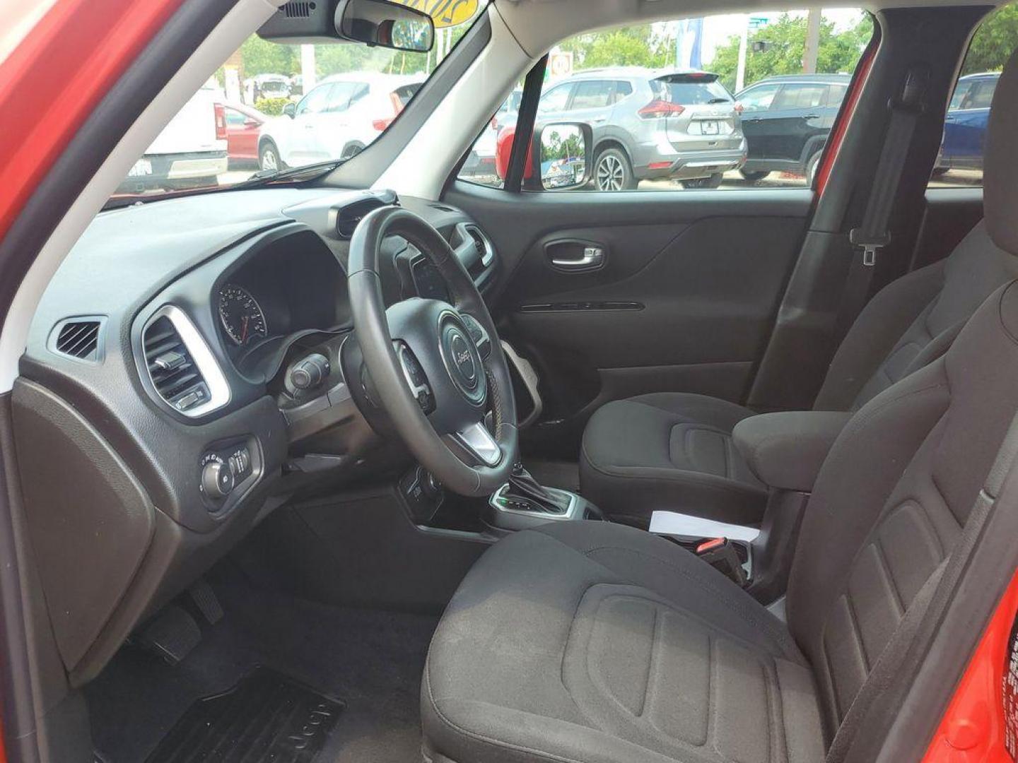 2020 Colorado Red Clearcoat /Black Jeep Renegade Latitude 4WD (ZACNJBBB4LP) with an 2.4L L4 DOHC 16V engine, 9A transmission, located at 234 Columbia Ave, Battle Creek, MI, 49015, (269) 222-0088, 42.298264, -85.192543 - <b>Vehicle Details</b><br>Get ready to conquer the roads with this stunning 2020 Jeep Renegade Latitude! This adventure-ready SUV is the perfect blend of rugged capability and modern sophistication. With its robust 4WD system, you'll easily tackle any terrain, whether you're navigating city streets - Photo#6