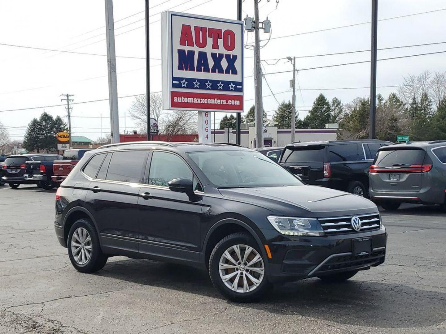 2020 Deep Black Pearl /Storm Gray Volkswagen Tiguan S 4Motion (3VV0B7AX6LM) with an 2.0L L4 DOHC 16V TURBO engine, 8A transmission, located at 6064 Gull Rd, Kalamazoo, MI, 49048, (269) 222-0088, 42.328388, -85.512924 - For sale: a 2020 Volkswagen Tiguan S 4Motion, a perfect blend of style, versatility, and reliability. This exceptional AWD SUV is powered by a robust 4-cylinder, 2.0L engine, offering a smooth and efficient driving experience. With a CARFAX Clean Report, this vehicle assures peace of mind and a hist - Photo#0