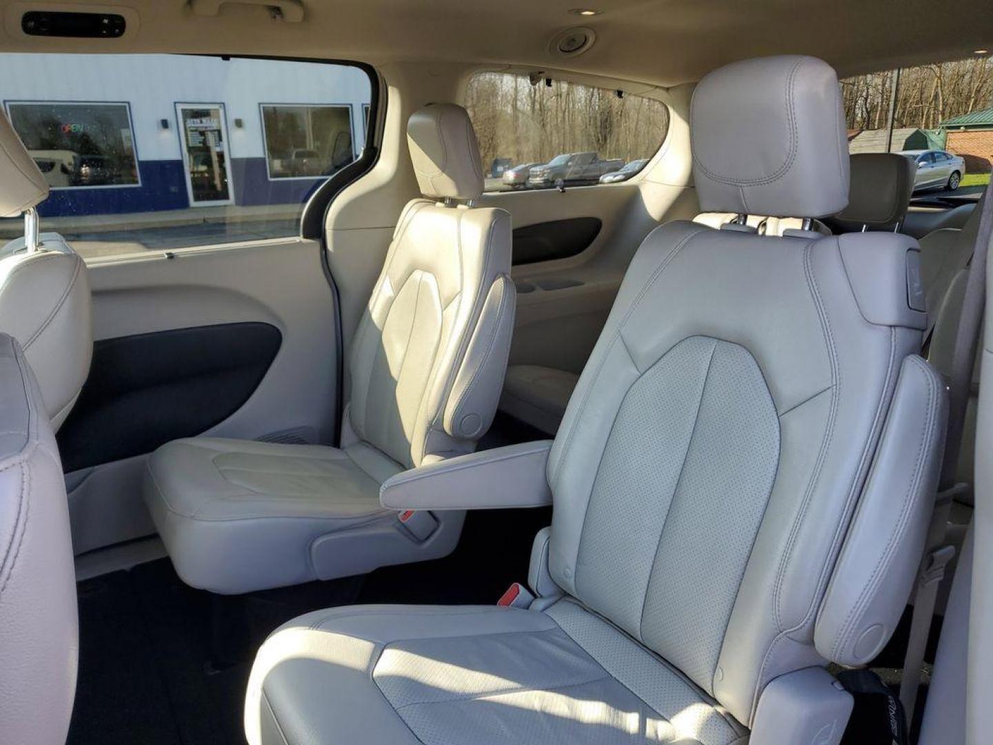2021 Luxury White Pearlcoat /Alloy/Black Chrysler Pacifica Touring-L (2C4RC1BG1MR) with an 3.6L V6 DOHC 24V engine, 9A transmission, located at 6064 Gull Rd, Kalamazoo, MI, 49048, (269) 222-0088, 42.328388, -85.512924 - <b>Vehicle Details</b><br>Discover the unparalleled comfort and sophistication of the 2021 Chrysler Pacifica Touring L, a minivan designed with both family and style in mind. This pristine model, with 0 miles on the odometer, offers an impressive blend of performance and luxury. Under the hood, you' - Photo#8