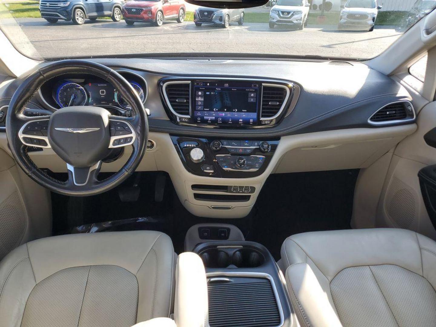 2021 Luxury White Pearlcoat /Alloy/Black Chrysler Pacifica Touring-L (2C4RC1BG1MR) with an 3.6L V6 DOHC 24V engine, 9A transmission, located at 6064 Gull Rd, Kalamazoo, MI, 49048, (269) 222-0088, 42.328388, -85.512924 - <b>Vehicle Details</b><br>Discover the unparalleled comfort and sophistication of the 2021 Chrysler Pacifica Touring L, a minivan designed with both family and style in mind. This pristine model, with 0 miles on the odometer, offers an impressive blend of performance and luxury. Under the hood, you' - Photo#9