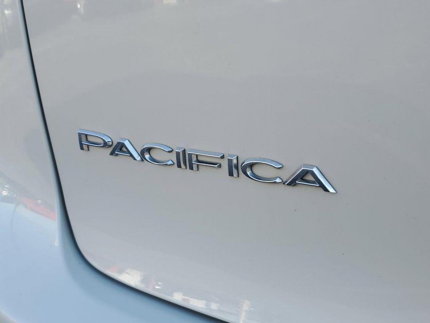 2021 Luxury White Pearlcoat /Alloy/Black Chrysler Pacifica Touring-L (2C4RC1BG1MR) with an 3.6L V6 DOHC 24V engine, 9A transmission, located at 6064 Gull Rd, Kalamazoo, MI, 49048, (269) 222-0088, 42.328388, -85.512924 - <b>Vehicle Details</b><br>Discover the unparalleled comfort and sophistication of the 2021 Chrysler Pacifica Touring L, a minivan designed with both family and style in mind. This pristine model, with 0 miles on the odometer, offers an impressive blend of performance and luxury. Under the hood, you' - Photo#5