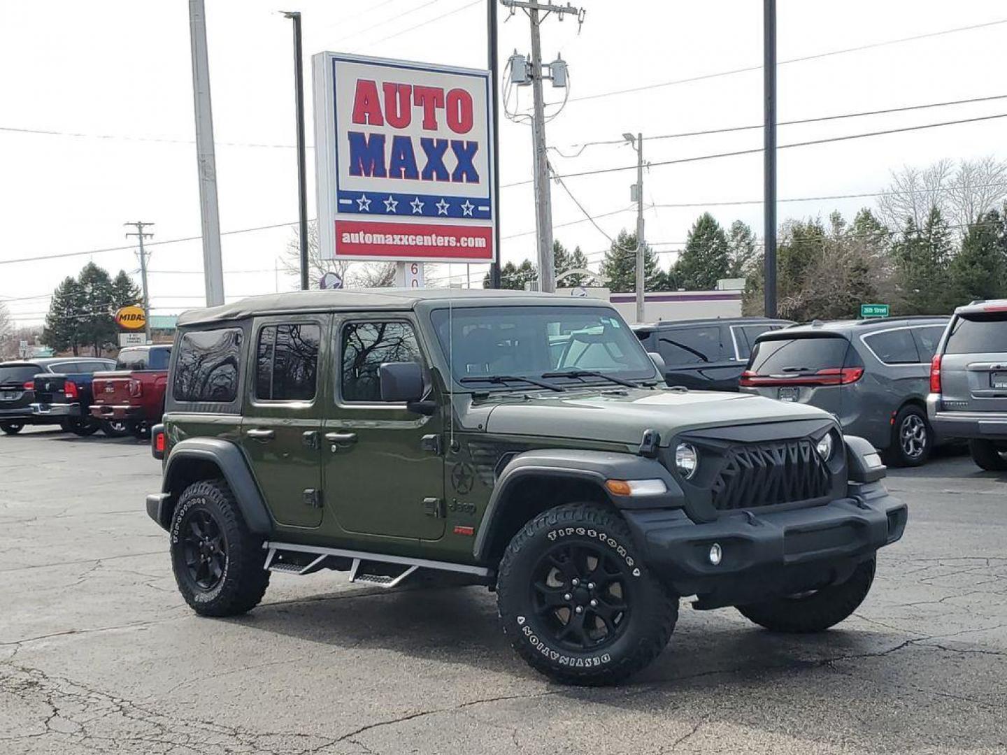 2021 Sarge Green Clearcoat /Black Jeep Wrangler Unlimited Sport (1C4HJXDN0MW) with an 2.0L L4 DOHC 16V TURBO engine, 6M transmission, located at 6064 Gull Rd, Kalamazoo, MI, 49048, (269) 222-0088, 42.328388, -85.512924 - <b>Vehicle Details</b><br>Discover the adventure-ready 2021 Jeep Wrangler Unlimited Sport S, now available with 0 miles on the odometer. This rugged yet refined SUV is equipped with a 4WD system, perfect for tackling any terrain with confidence. Under the hood, you'll find a robust 4-cylinder, 2.0L - Photo#0