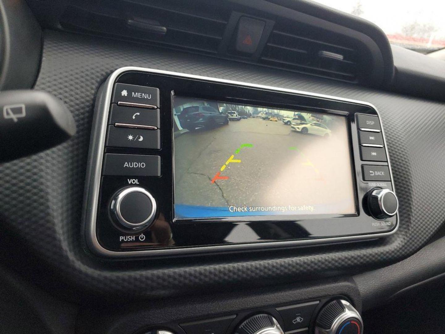2021 Electric Blue Metallic /Charcoal Nissan Kicks S (3N1CP5BV2ML) with an 1.6L L4 engine, CVT transmission, located at 234 Columbia Ave, Battle Creek, MI, 49015, (269) 222-0088, 42.298264, -85.192543 - Discover the perfect blend of style, efficiency, and technology with our 2021 Nissan Kicks S, now available at our dealership. This compact SUV, equipped with a fuel-efficient 4-cylinder, 1.6L engine, offers an enjoyable and economical driving experience, making it an ideal choice for both city comm - Photo#18