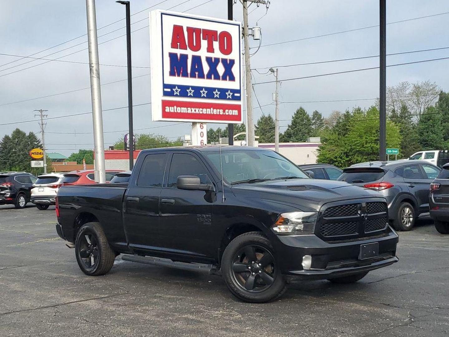 2021 Diamond Black Crystal Pearl /Diesel Grey/Black RAM 1500 Classic Tradesman Quad Cab 4WD (1C6RR7FG5MS) with an 3.6L V6 DOHC 24V FFV engine, 8A transmission, located at 6064 Gull Rd, Kalamazoo, MI, 49048, (269) 222-0088, 42.328388, -85.512924 - Rev up your adventure with this dynamic 2021 Ram 1500 Classic Express! With just 46,538 miles on the odometer, this powerhouse is ready to elevate your driving experience to new heights. Equipped with a robust V6, 3.6L engine and 4WD capability, this truck is built to conquer both city streets and r - Photo#0