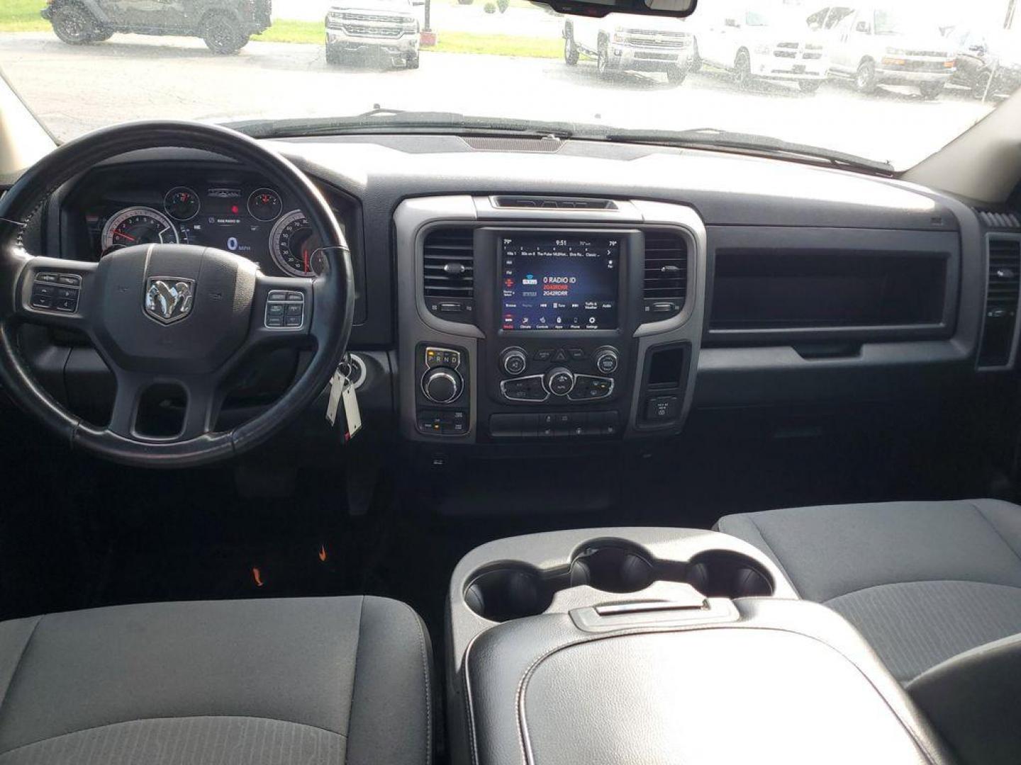 2021 Diamond Black Crystal Pearl /Diesel Grey/Black RAM 1500 Classic Tradesman Quad Cab 4WD (1C6RR7FG5MS) with an 3.6L V6 DOHC 24V FFV engine, 8A transmission, located at 6064 Gull Rd, Kalamazoo, MI, 49048, (269) 222-0088, 42.328388, -85.512924 - Rev up your adventure with this dynamic 2021 Ram 1500 Classic Express! With just 46,538 miles on the odometer, this powerhouse is ready to elevate your driving experience to new heights. Equipped with a robust V6, 3.6L engine and 4WD capability, this truck is built to conquer both city streets and r - Photo#8