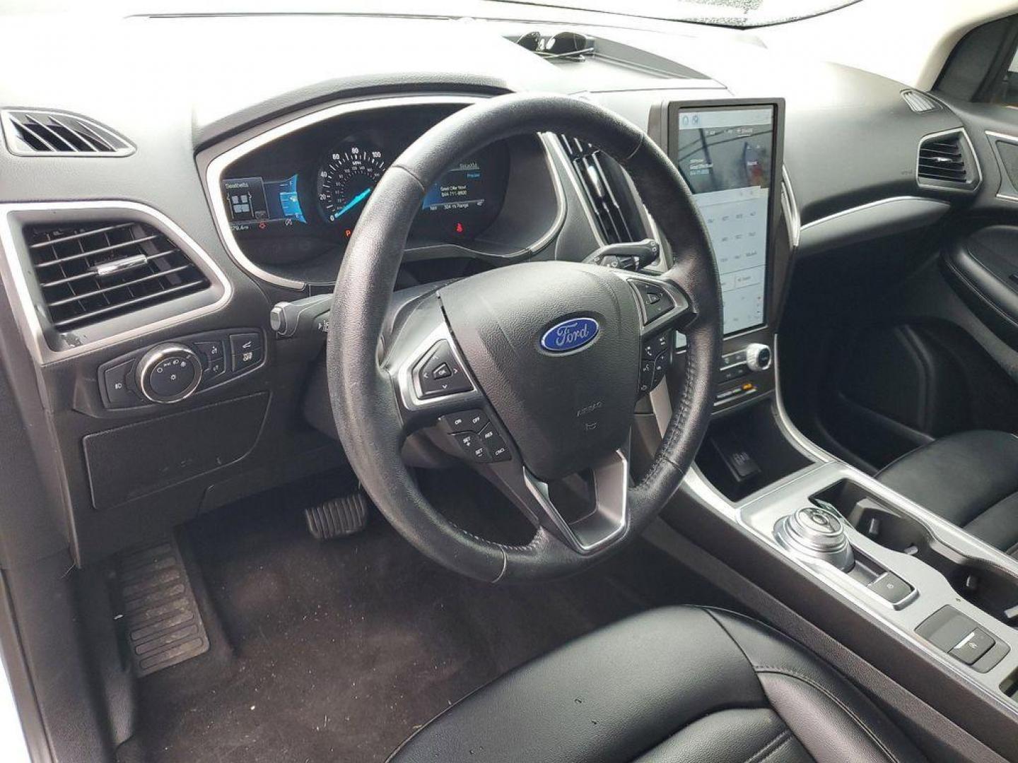 2022 Oxford White /Ebony Ford Edge SEL AWD (2FMPK4J90NB) with an 2.0L L4 DOHC 16V engine, 6A transmission, located at 234 Columbia Ave, Battle Creek, MI, 49015, (269) 222-0088, 42.298264, -85.192543 - Equipment Group 201A: 18" Sparkle Silver-Painted Aluminum Wheels; 3.80 Axle Ratio; ActiveX Seating Material Heated Bucket Seats; 8-Speed Automatic Transmission with SelectShift; Twin-Scroll 2.0L EcoBoost Engine; 245/60R18 AS BSW Tires; TBD GVWR; AM/FM Stereo/MP3 Capable Radio Mini Spare Wheel LED Da - Photo#10