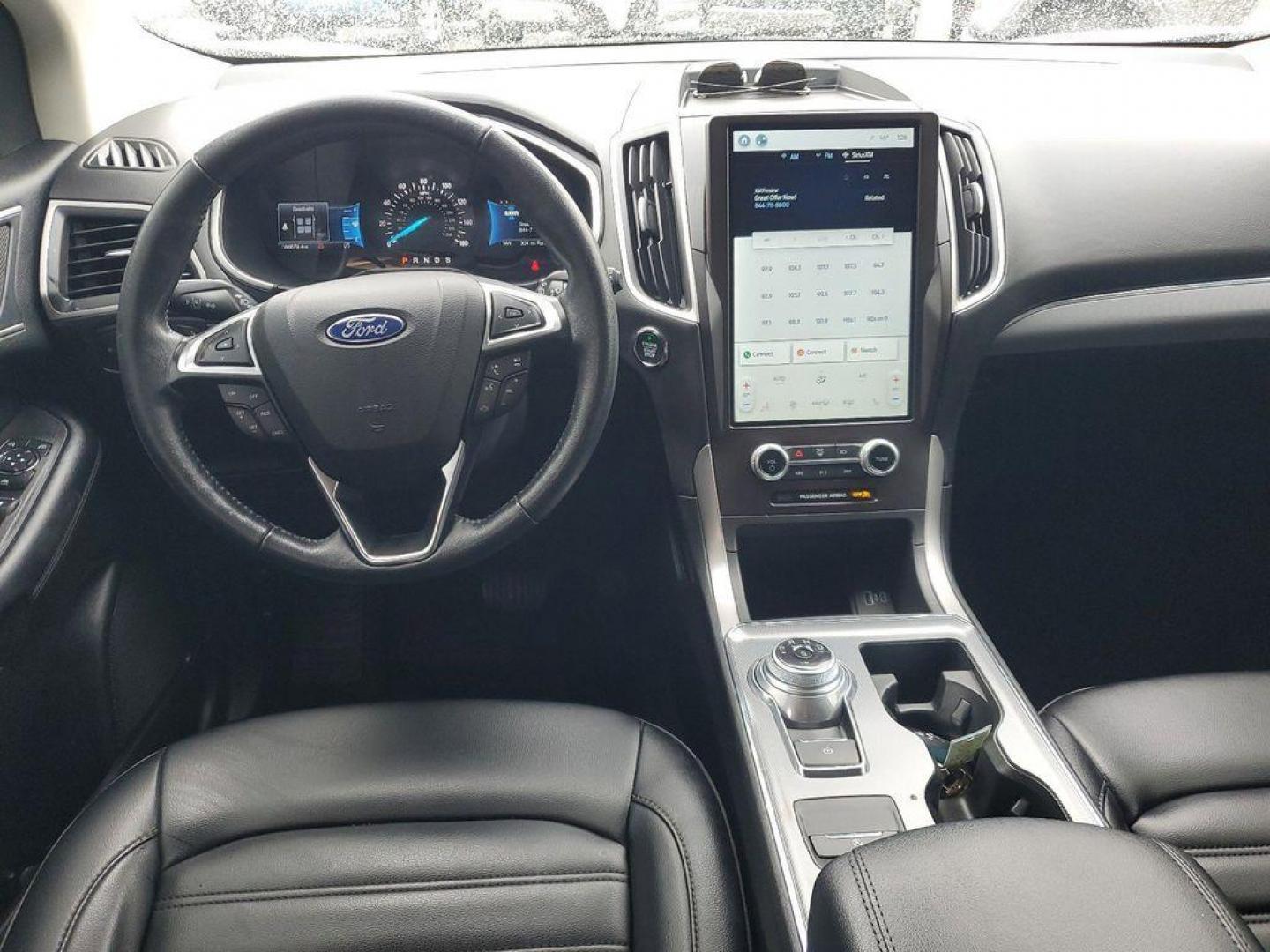 2022 Oxford White /Ebony Ford Edge SEL AWD (2FMPK4J90NB) with an 2.0L L4 DOHC 16V engine, 6A transmission, located at 234 Columbia Ave, Battle Creek, MI, 49015, (269) 222-0088, 42.298264, -85.192543 - Equipment Group 201A: 18" Sparkle Silver-Painted Aluminum Wheels; 3.80 Axle Ratio; ActiveX Seating Material Heated Bucket Seats; 8-Speed Automatic Transmission with SelectShift; Twin-Scroll 2.0L EcoBoost Engine; 245/60R18 AS BSW Tires; TBD GVWR; AM/FM Stereo/MP3 Capable Radio Mini Spare Wheel LED Da - Photo#25