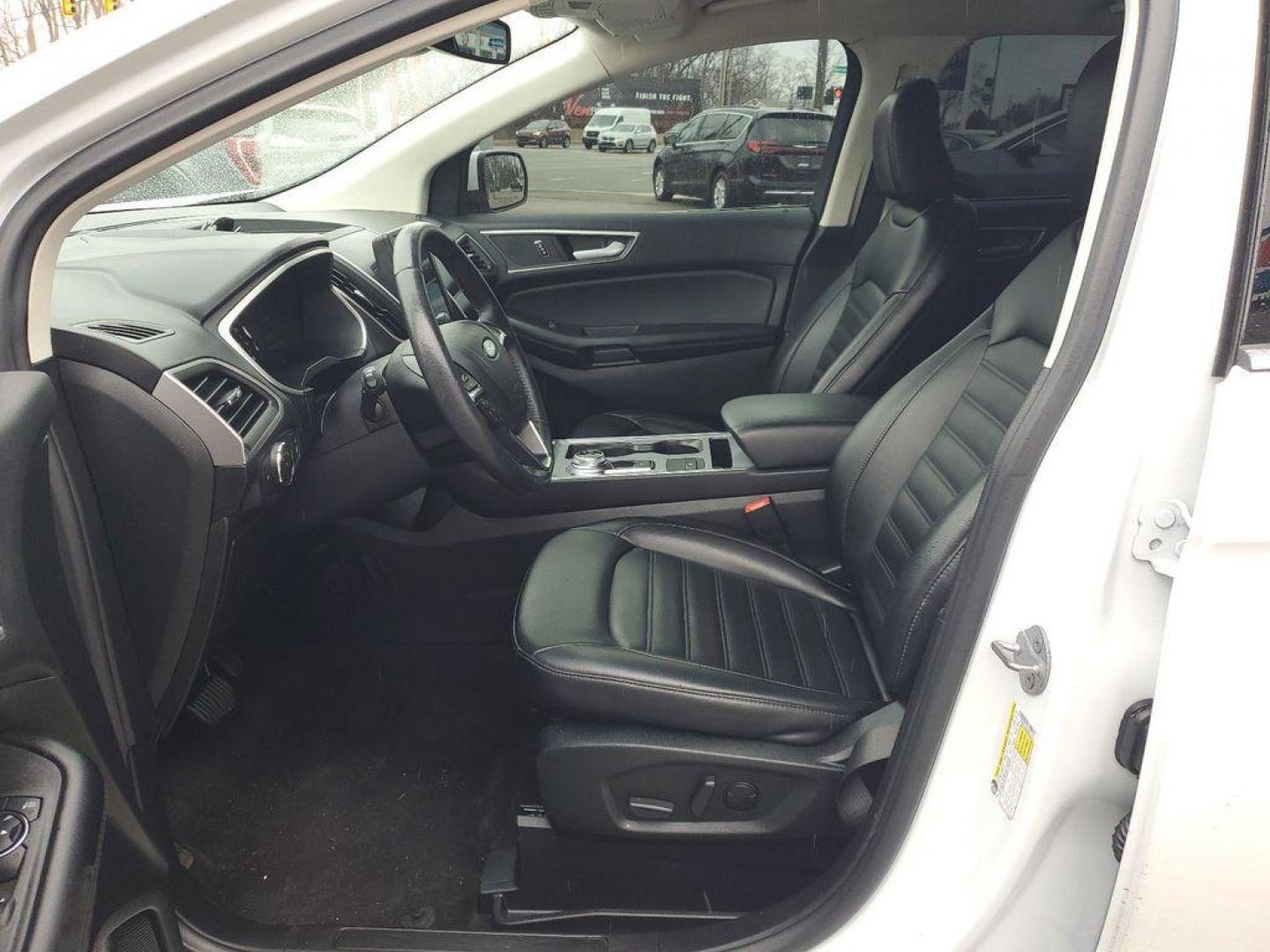 2022 Oxford White /Ebony Ford Edge SEL AWD (2FMPK4J90NB) with an 2.0L L4 DOHC 16V engine, 6A transmission, located at 234 Columbia Ave, Battle Creek, MI, 49015, (269) 222-0088, 42.298264, -85.192543 - Equipment Group 201A: 18" Sparkle Silver-Painted Aluminum Wheels; 3.80 Axle Ratio; ActiveX Seating Material Heated Bucket Seats; 8-Speed Automatic Transmission with SelectShift; Twin-Scroll 2.0L EcoBoost Engine; 245/60R18 AS BSW Tires; TBD GVWR; AM/FM Stereo/MP3 Capable Radio Mini Spare Wheel LED Da - Photo#7
