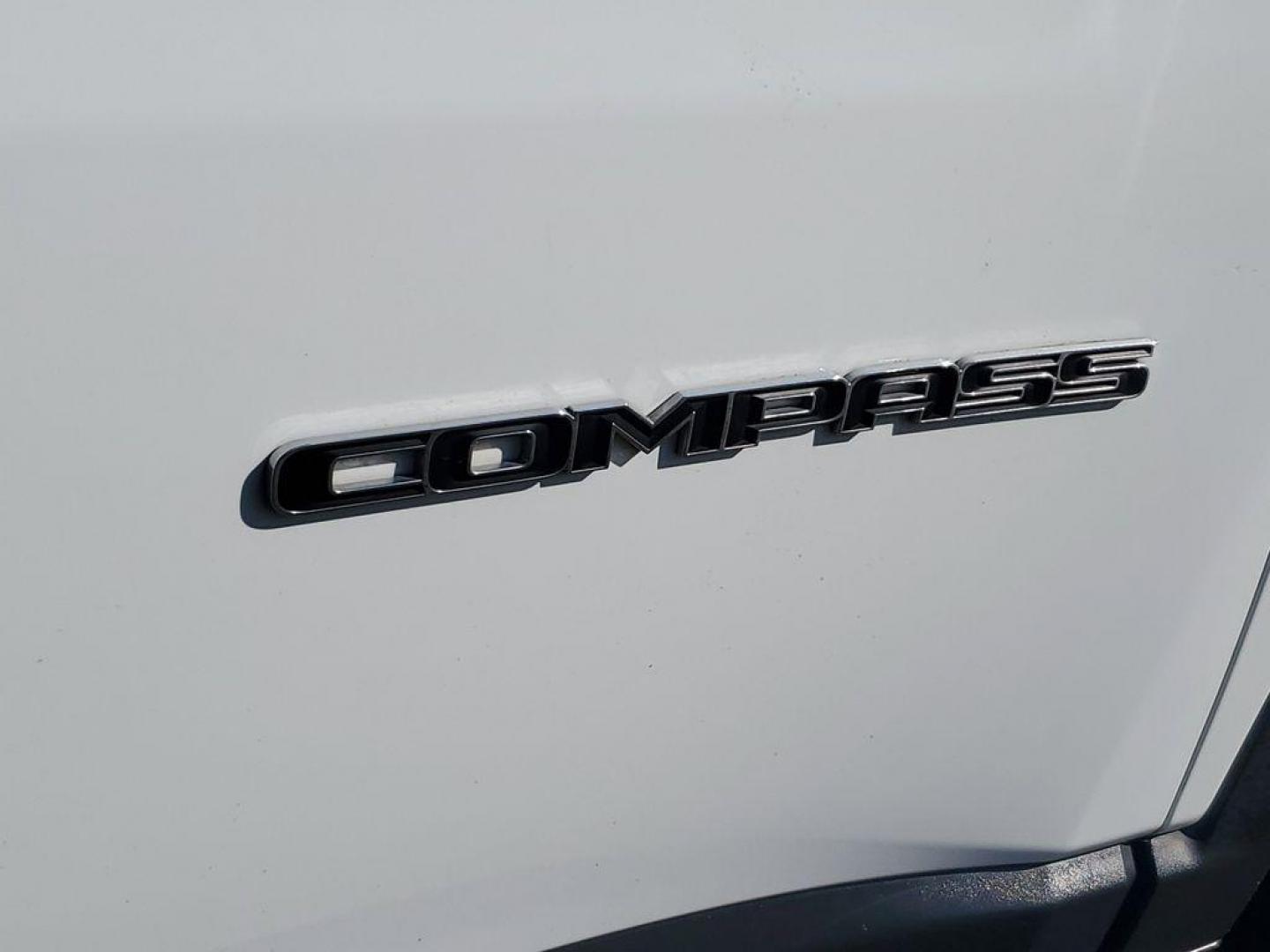 2023 Bright White Clearcoat /BLACK Jeep Compass Latitude (3C4NJDBNXPT) with an 2.0L L4 DOHC 16V TURBO engine, 8-speed automatic transmission, located at 6064 Gull Rd, Kalamazoo, MI, 49048, (269) 222-0088, 42.328388, -85.512924 - Experience the perfect blend of style, performance, and technology with this pre-owned 2023 Jeep Compass Latitude. Equipped with a robust 4-cylinder, 2.0L engine and advanced 4WD capabilities, this vehicle is ready to tackle both city streets and off-road adventures with confidence. The Jeep Compass - Photo#6