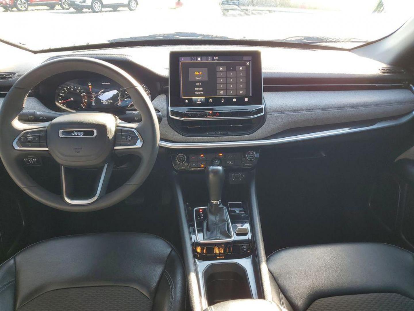 2023 Bright White Clearcoat /BLACK Jeep Compass Latitude (3C4NJDBNXPT) with an 2.0L L4 DOHC 16V TURBO engine, 8-speed automatic transmission, located at 6064 Gull Rd, Kalamazoo, MI, 49048, (269) 222-0088, 42.328388, -85.512924 - Experience the perfect blend of style, performance, and technology with this pre-owned 2023 Jeep Compass Latitude. Equipped with a robust 4-cylinder, 2.0L engine and advanced 4WD capabilities, this vehicle is ready to tackle both city streets and off-road adventures with confidence. The Jeep Compass - Photo#10